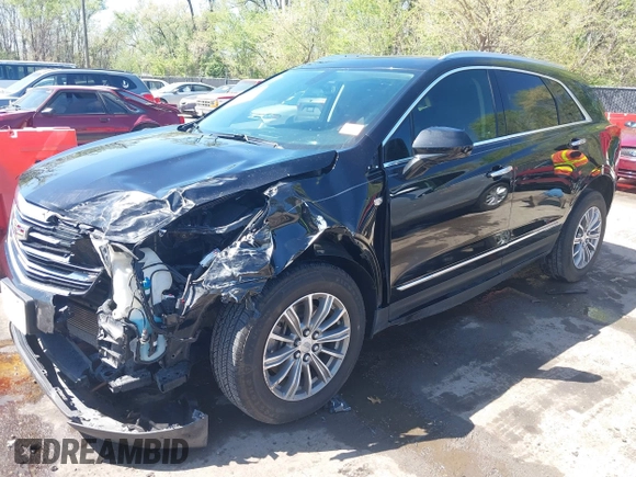 2017 Cadillac XT5 Luxury FWD z VIN 1GYKNBRS7HZ227732, wystawiony jako IAAI lot #42035099 z przebiegiem 76 260 mil mil oraz . Historia ofert i sprzedaży dostępna na DreamBid. Obrazek 18.
