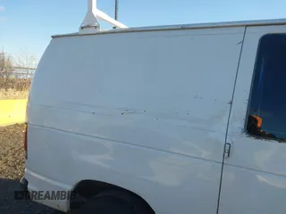 2004 Ford Econoline Cargo with VIN 1FTSE34L84HA87783, listed as a IAAI auction lot 41222516 with 245,991 mi miles and . Bid and sale history available at carsss.com. Image 13.