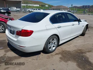 2015 BMW 5 Series 528i xDrive with VIN WBA5A7C54FG143565, listed as a IAAI auction lot 41948957 with 107,255 mi miles and . Bid and sale history available at carsss.com. Image 4.