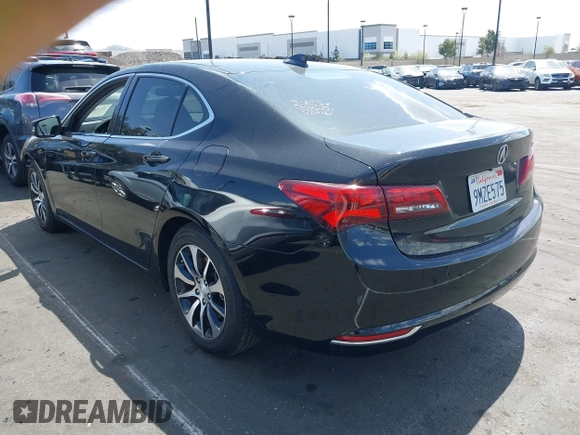 2015 Acura TLX with VIN 19UUB1F36FA011026, listed as a IAAI auction lot 41905909 with 106,519 mi miles and . Bid and sale history available at DreamBid. Image 3.