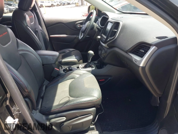 2017 Jeep Cherokee Trailhawk with VIN 1C4PJMBS9HW537962, listed as a IAAI auction lot 42002460 with 129,037 mi miles and . Bid and sale history available at DreamBid. Image 5.