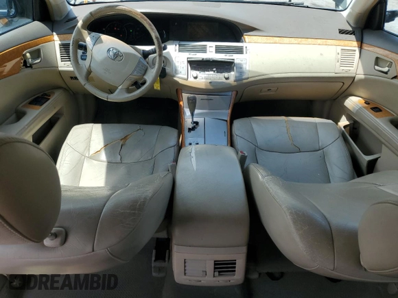 2005 Toyota Avalon XL z VIN 4T1BK36B05U022928, wystawiony jako Copart lot #59137785 z przebiegiem 146 854 mil mil oraz Szkoda całkowita • Salvage title. Historia ofert i sprzedaży dostępna na DreamBid. Obrazek 8.