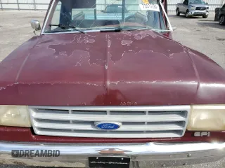 1991 Ford F-150 with VIN 1FTDF15Y7MLA15992, listed as a Copart auction lot 73517284 with 89,570 mi miles and Salvage Title. Bid and sale history available at carsss.com. Image 12.