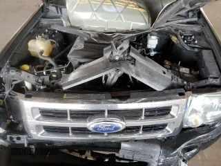 2010 Ford Escape Limited with VIN 1FMCU9EG2AKA78650, listed as a Copart auction lot 54402195 with 103,547 mi miles and Salvage title. Bid and sale history available at DreamBid. Image 11.