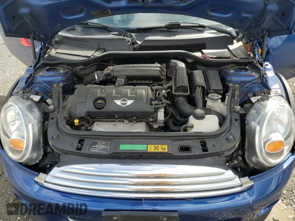 2014 MINI Convertible with VIN WMWZN3C55ET861078, listed as a Copart auction lot 50240665 with 50,541 mi miles and Salvage Title. Bid and sale history available at DreamBid. Image 11.