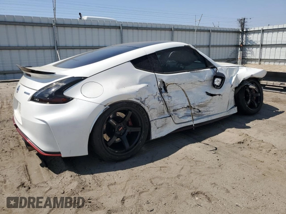 2015 Nissan 370Z Nismo z VIN JN1AZ4EH3FM441254, wystawiony jako Copart lot #52646145 z przebiegiem 74 303 mil mil oraz Szkoda całkowita • Salvage title. Historia ofert i sprzedaży dostępna na DreamBid. Obrazek 3.