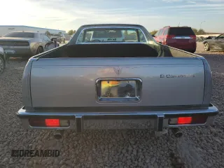 1983 Chevrolet El Camino z VIN 1GCCW80H1DR150636, wystawiony jako Copart lot #85873984 z przebiegiem 56 394 mil mil oraz Czysty tytuł • Clean title. Historia ofert i sprzedaży dostępna na DreamBid. Obrazek 6.