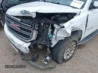 2019 GMC Yukon XL SLT with VIN 1GKS2GKC7KR165419, listed as a IAAI auction lot 40977930 with 167,195 mi miles and . Bid and sale history available at carsss.com. Image 6.