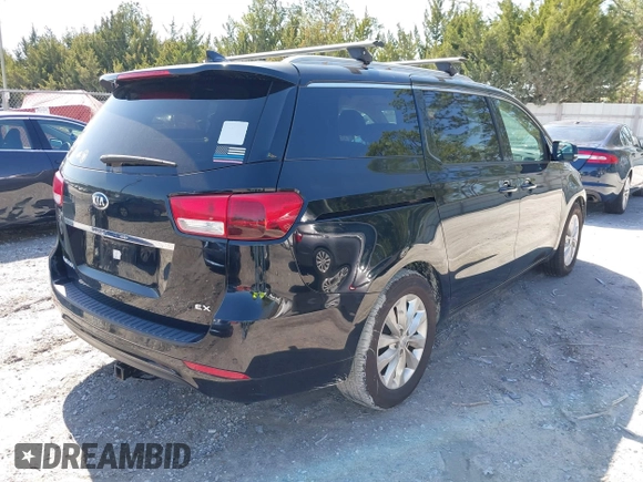 2017 Kia Sedona EX with VIN KNDMC5C13H6263232, listed as a IAAI auction lot 41733170 with 102,026 mi miles. Bid and sale history available at carsss.com. Image 4.