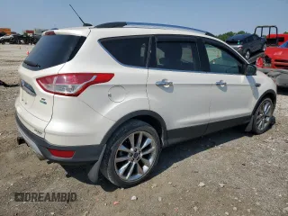 2014 Ford Escape SE z VIN 1FMCU9G92EUC58400, wystawiony jako Copart lot #60491005 z przebiegiem 72 462 mil mil oraz Szkoda całkowita • Salvage title. Historia ofert i sprzedaży dostępna na DreamBid. Obrazek 3.