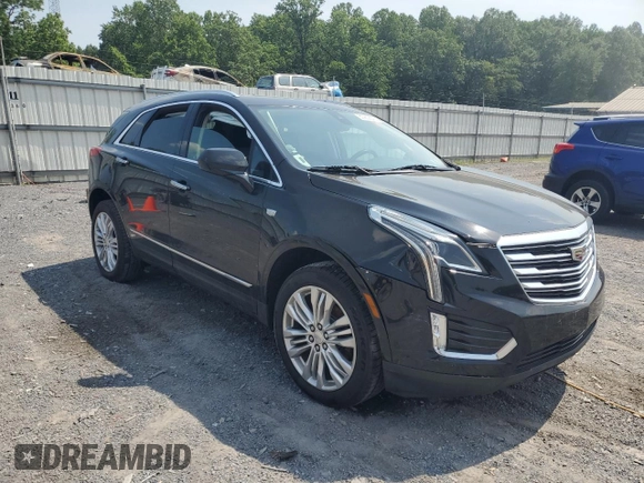 2019 Cadillac XT5 Premium Luxury AWD with VIN 1GYKNFRS9KZ223065, listed as a Copart auction lot 60902645 with 101,168 mi miles and Salvage title. Bid and sale history available at DreamBid. Image 4.