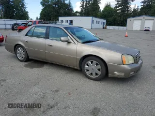 2004 Cadillac DeVille DTS z VIN 1G6KF579X4U212415, wystawiony jako Copart lot #58005555 z przebiegiem 97 663 mil mil oraz Tytuł czysty. Historia ofert i sprzedaży dostępna na DreamBid. Obrazek 4.