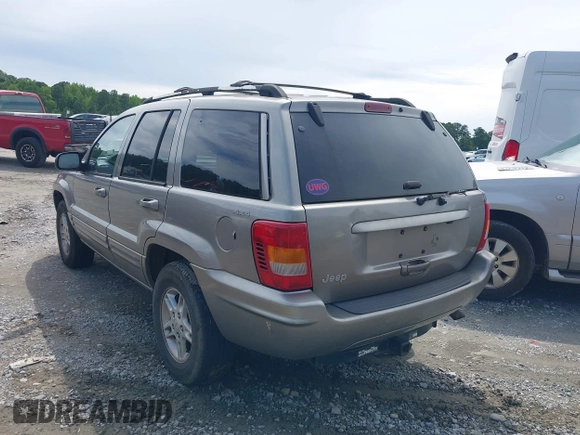 1999 Jeep Grand Cherokee Limited with VIN 1J4GW68N9XC808639, listed as a IAAI auction lot 42521785 with 156,864 mi miles and . Bid and sale history available at DreamBid. Image 3.