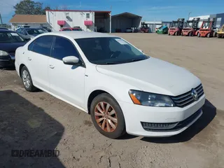 2015 Volkswagen Passat 1.8T Limited Edition with VIN 1VWAT7A38FC043258, listed as a IAAI auction lot 41433514 with 111,169 mi miles. Bid and sale history available at carsss.com. Image 1.