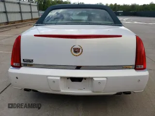 2006 Cadillac DTS 1SD z VIN 1G6KD57Y86U146074, wystawiony jako Copart lot #52917235 z przebiegiem 133 956 mil mil oraz Tytuł czysty. Historia ofert i sprzedaży dostępna na DreamBid. Obrazek 6.