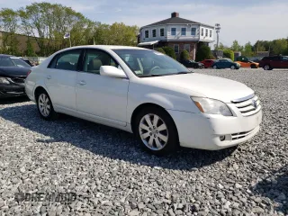 2007 Toyota Avalon XL z VIN 4T1BK36B27U215021, wystawiony jako Copart lot #56408185 z przebiegiem 202 572 mil mil oraz Czysty tytuł • Clean title. Historia ofert i sprzedaży dostępna na DreamBid. Obrazek 4.