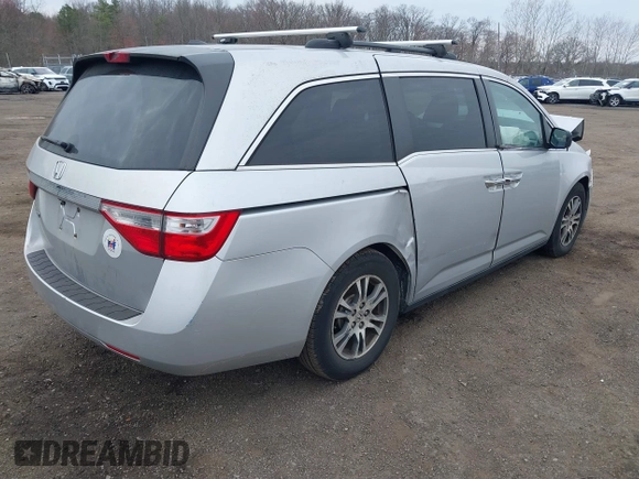 2013 Honda Odyssey EX-L with VIN 5FNRL5H65DB050789, listed as a IAAI auction lot 41911537 with 160,348 mi miles and . Bid and sale history available at carsss.com. Image 4.