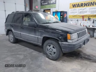 1995 Jeep Grand Cherokee Laredo with VIN 1J4GZ58S6SC765863, listed as a IAAI auction lot 41797726 with 234,715 mi miles and . Bid and sale history available at DreamBid. Image 1.