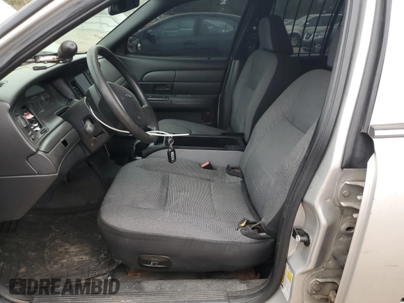 2008 Ford Police Interceptor with VIN 2FAFP71V28X131278, listed as a Copart auction lot 53791315 with 166,096 mi miles and Salvage title. Bid and sale history available at DreamBid. Image 7.