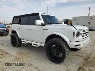 2021 Ford Bronco with VIN 1FMEE5BH5MLB03650, listed as a Copart auction lot 43584385 with 12,104 mi miles and Salvage Title. Bid and sale history available at DreamBid. Image 4.
