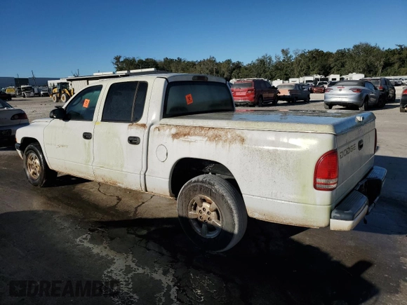 2001 Dodge Dakota z VIN 1B7HL2AX41S256519, wystawiony jako Copart lot #81951634 z przebiegiem Nie podano mil oraz Nie do naprawy • Non repairable. Historia ofert i sprzedaży dostępna na DreamBid. Obrazek 2.
