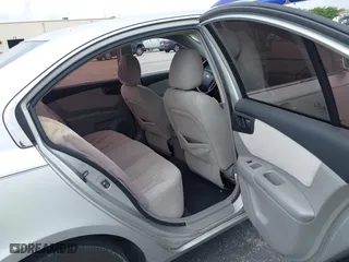 2007 Kia Optima LX with VIN KNAGE123175135348, listed as a IAAI auction lot 41887004 with 149,094 mi miles. Bid and sale history available at carsss.com. Image 8.