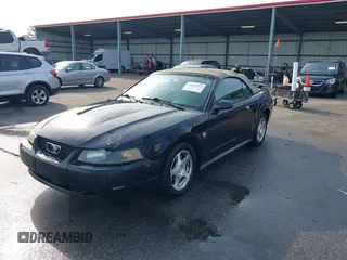 2004 Ford Mustang Deluxe with VIN 1FAFP446X4F187154, listed as a IAAI auction lot 42068363 with 125,074 mi miles. Bid and sale history available at carsss.com. Image 2.