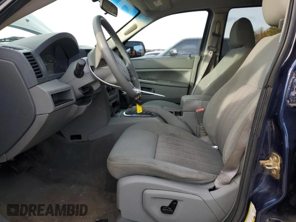 2006 Jeep Grand Cherokee Laredo with VIN 1J4HS48N36C254727, listed as a Copart auction lot 85730814 with 154,404 mi miles and Salvage Title. Bid and sale history available at carsss.com. Image 7.