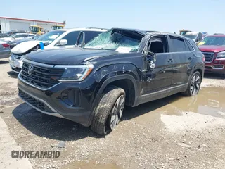 2024 Volkswagen Atlas SEL with VIN 1V2BE2CA3RC233021, listed as a IAAI auction lot 42185251 with 23,398 mi miles and . Bid and sale history available at DreamBid. Image 2.