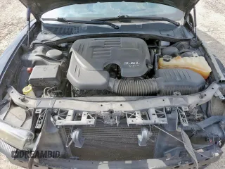 2014 Dodge Charger SXT z VIN 2C3CDXHGXEH295353, wystawiony jako Copart lot #58781935 z przebiegiem 181 199 mil mil oraz Szkoda całkowita • Salvage title. Historia ofert i sprzedaży dostępna na DreamBid. Obrazek 11.