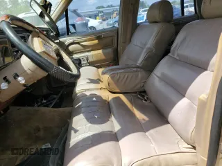 1989 Lincoln Town Car z VIN 1LNBM81F8KY816906, wystawiony jako Copart lot #51316715 z przebiegiem 361 830 mil mil oraz Szkoda całkowita • Salvage title. Historia ofert i sprzedaży dostępna na DreamBid. Obrazek 7.