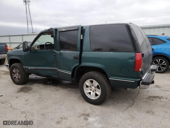 1997 Chevrolet Tahoe with VIN 1GNEK13R5VJ420751, listed as a Copart auction lot 44770025 with 236,378 mi miles and Salvage Title. Bid and sale history available at carsss.com. Image 2.
