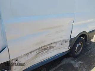 2016 Ford Transit Cargo with VIN 1FTYE1YM8GKA55568, listed as a IAAI auction lot 42055170 with 171,065 mi miles and . Bid and sale history available at DreamBid. Image 6.
