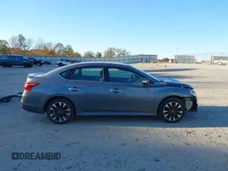 2019 Nissan Sentra S z VIN 3N1AB7APXKY265054, wystawiony jako IAAI lot #40929593 z przebiegiem 75 298 mil mil oraz . Historia ofert i sprzedaży dostępna na DreamBid. Obrazek 14.