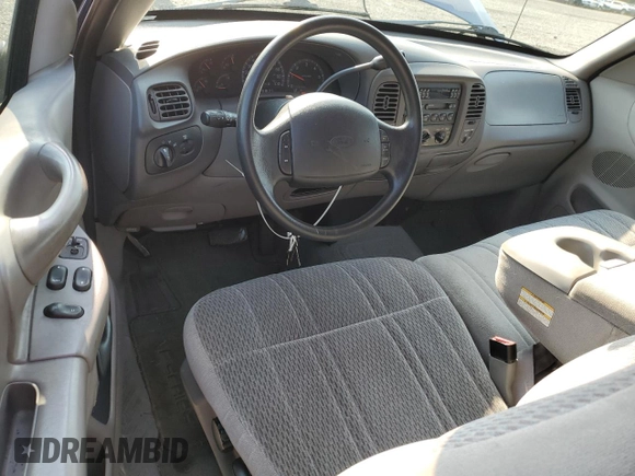 1998 Ford F-150 with VIN 1FTZX1765WKA33379, listed as a Copart auction lot 62009135 with 152,607 mi miles and Salvage title. Bid and sale history available at DreamBid. Image 8.
