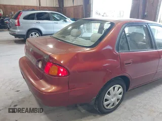 2002 Toyota Corolla CE with VIN 2T1BR12E32C544997, listed as a IAAI auction lot 42621712 with 113,660 mi miles and . Bid and sale history available at DreamBid. Image 6.