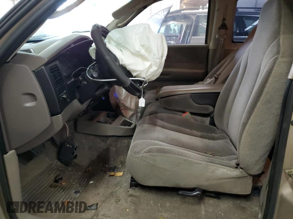 2003 Dodge Dakota SLT z VIN 1D7HL42N63S132141, wystawiony jako Copart lot #56138235 z przebiegiem 219 246 mil mil oraz Szkoda całkowita • Salvage title. Historia ofert i sprzedaży dostępna na DreamBid. Obrazek 7.