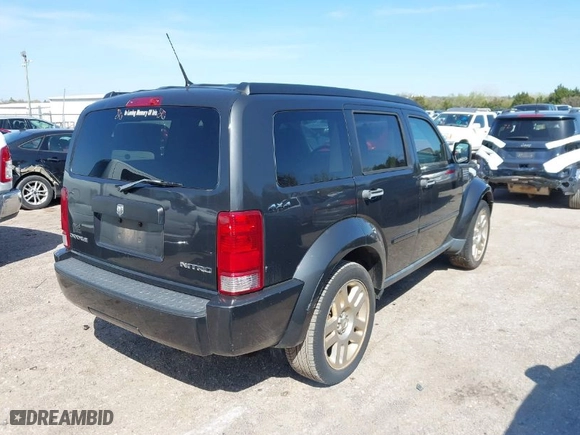 2011 Dodge Nitro Heat with VIN 1D4PU4GK6BW549562, listed as a IAAI auction lot 41992334 with 137,481 mi miles. Bid and sale history available at carsss.com. Image 4.