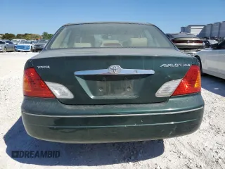 2001 Toyota Avalon XL with VIN 4T1BF28B21U116895, listed as a Copart auction lot 48507255 with 211,361 mi miles and Salvage Title. Bid and sale history available at DreamBid. Image 6.