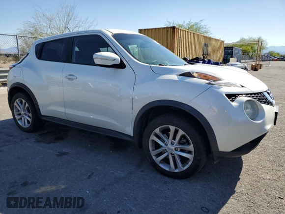 2015 Nissan Juke SV with VIN JN8AF5MVXFT563820, listed as a Copart auction lot 56434305 with 103,265 mi miles and Salvage title. Bid and sale history available at DreamBid. Image 4.
