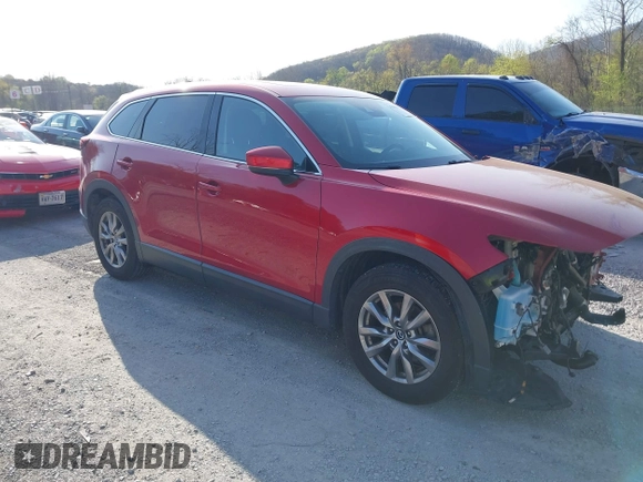 2019 Mazda CX-9 Touring with VIN JM3TCACY0K0310851, listed as a IAAI auction lot 42066395 with 91,046 mi miles and . Bid and sale history available at DreamBid. Image 1.