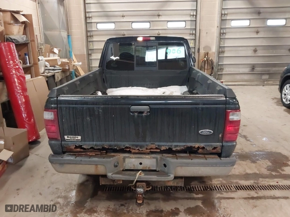 2003 Ford Ranger XL Fleet with VIN 1FTZR45EX3PA43491, listed as a IAAI auction lot 41492928 with 233,435 mi miles. Bid and sale history available at carsss.com. Image 16.