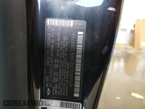 2011 MINI Hardtop with VIN WMWSU3C59BT099759, listed as a Copart auction lot 53995355 with 141,575 mi miles and Salvage Title. Bid and sale history available at DreamBid. Image 13.