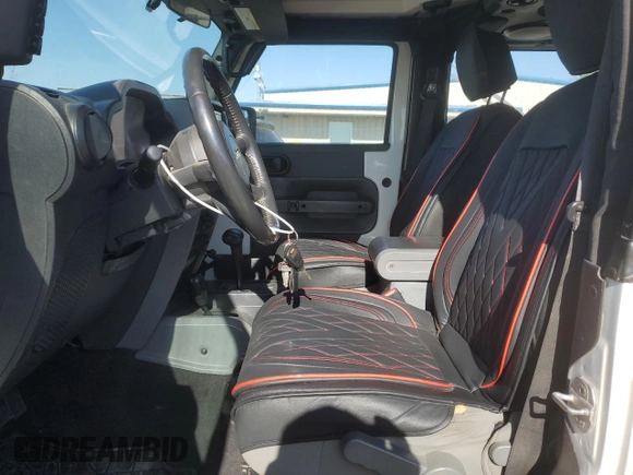 2010 Jeep Wrangler Rubicon with VIN 1J4BA6D18AL221240, listed as a Copart auction lot 57819025 with 78,120 mi miles and Salvage title. Bid and sale history available at DreamBid. Image 7.