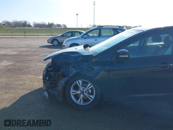 2013 Ford Focus SE with VIN 1FADP3F28DL260843, listed as a IAAI auction lot 41889090 with 131,636 mi miles. Bid and sale history available at carsss.com. Image 6.