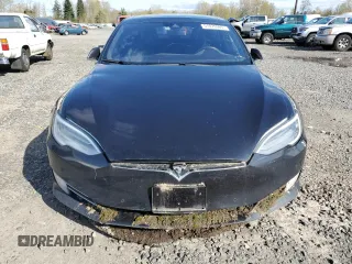 2016 Tesla Model S 90D with VIN 5YJSA1E2XGF150490, listed as a Copart auction lot 51070365 with 144,457 mi miles and Salvage Title. Bid and sale history available at DreamBid. Image 5.