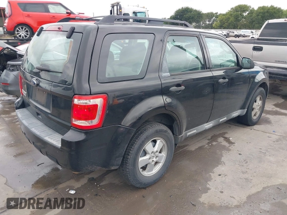 2011 Ford Escape XLS z VIN 1FMCU0C73BKB97601, wystawiony jako IAAI lot #42498599 z przebiegiem 243 282 mil mil oraz . Historia ofert i sprzedaży dostępna na DreamBid. Obrazek 4.