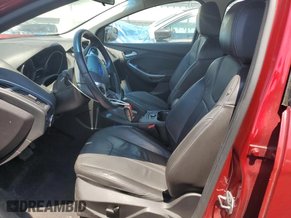 2014 Ford Focus Titanium z VIN 1FADP3N29EL409568, wystawiony jako Copart lot #62295345 z przebiegiem 53 401 mil mil oraz Szkoda całkowita • Salvage title. Historia ofert i sprzedaży dostępna na DreamBid. Obrazek 7.