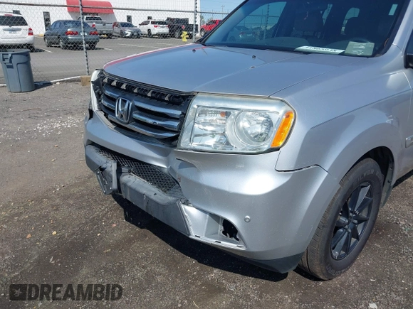 2013 Honda Pilot Touring with VIN 5FNYF3H95DB032438, listed as a IAAI auction lot 41865938 with 298,973 mi miles and . Bid and sale history available at DreamBid. Image 6.