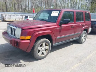 2007 Jeep Commander Sport with VIN 1J8HG48K27C661932, listed as a IAAI auction lot 42132895 with 255,707 mi miles. Bid and sale history available at carsss.com. Image 2.